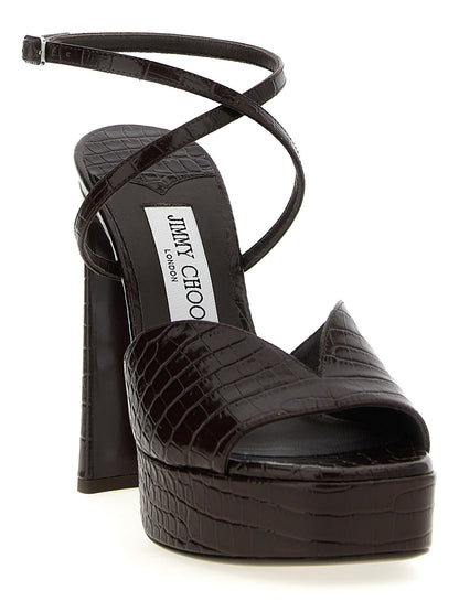 Platform Stiletto Ankle Strap Sandals by Jimmy Choo for women in polyester crocodile skin leather brown & print presents a sculptural silhouette, showcasing the Women's Polyester Crocodile Skin Leather Platform Stiletto Ankle Strap Sandals design with a sculptural stiletto platform and square toe style for a premium look.