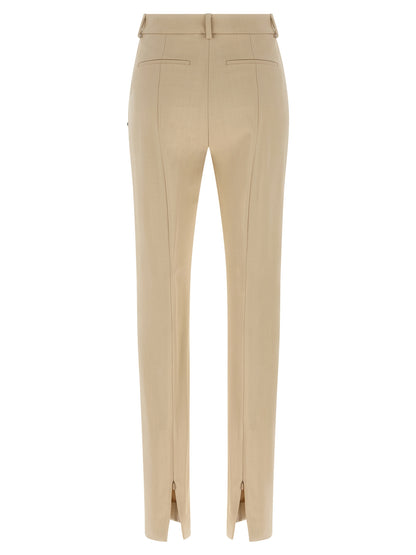 Trousers by Sportmax for women in stretch viscose beige features an sartorial silhouette, showcasing a precise cigarette and long with a sartorial low rise for a refined look.