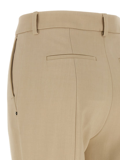 Trousers by Sportmax for women in stretch viscose beige features a artisanal silhouette, showcasing a sophisticated cigarette with a long and low rise for a artisanal finish.