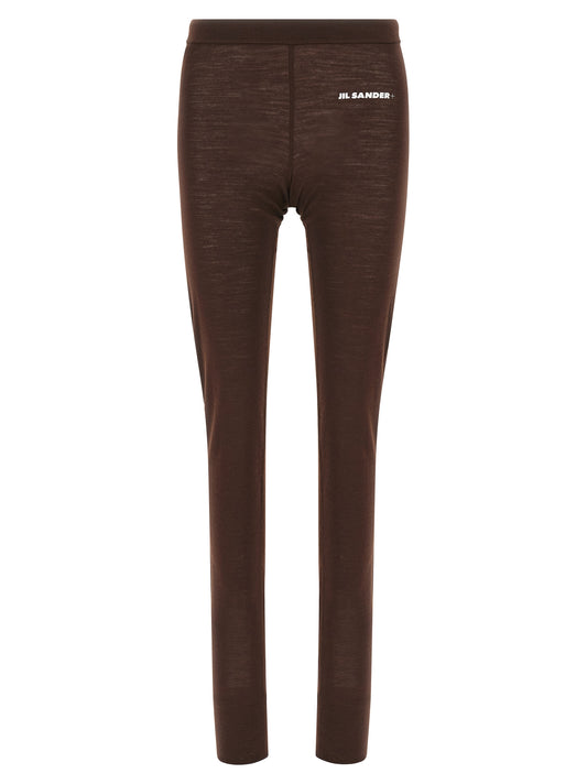Activewear Leggings by Jil Sander for women in polyester & virgin wool bordeaux & print features a contemporary silhouette, showcasing advanced with a contemporary leggings, long, and .