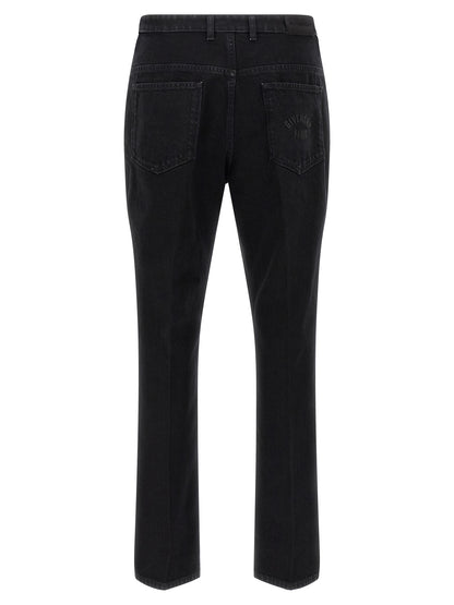 Jeans by Givenchy for men in stretch denim cotton & suede leather black features a polished silhouette with a polished straight-leg, reaching a polished long and finished with a polished .
