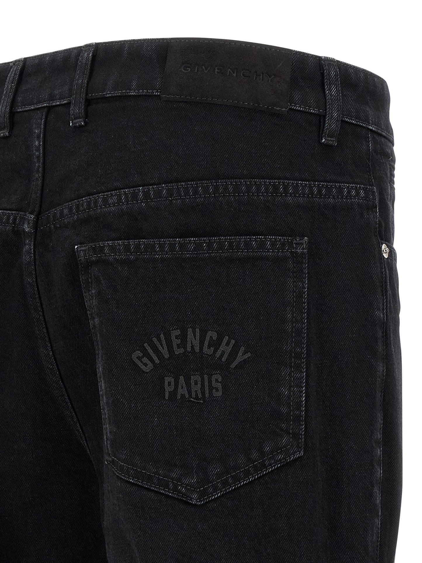 Jeans by Givenchy for men in stretch denim cotton & suede leather black presents a tailored silhouette, showcasing a tailored straight-leg and long cut with a refined for a truly tailored aesthetic.