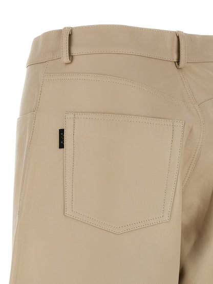 Pants by Haikure for women in lamb leather beige features an understated silhouette, showcasing a sophisticated straight-leg & wide and long with a refined high rise for an understated, polished aesthetic.