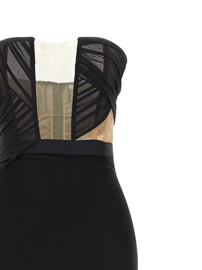 Dress by Nensi Dojaka for women in stretch viscose polyester black & transparent features a dramatic silhouette, showcasing an elegant and that flows into a dramatic maxi long.
