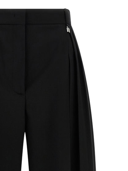 Trousers by Giuseppe Di Morabito for women in canvas & virgin wool black features an on trend silhouette, showcasing a sophisticated wide with a long and high rise for an on trend finish.