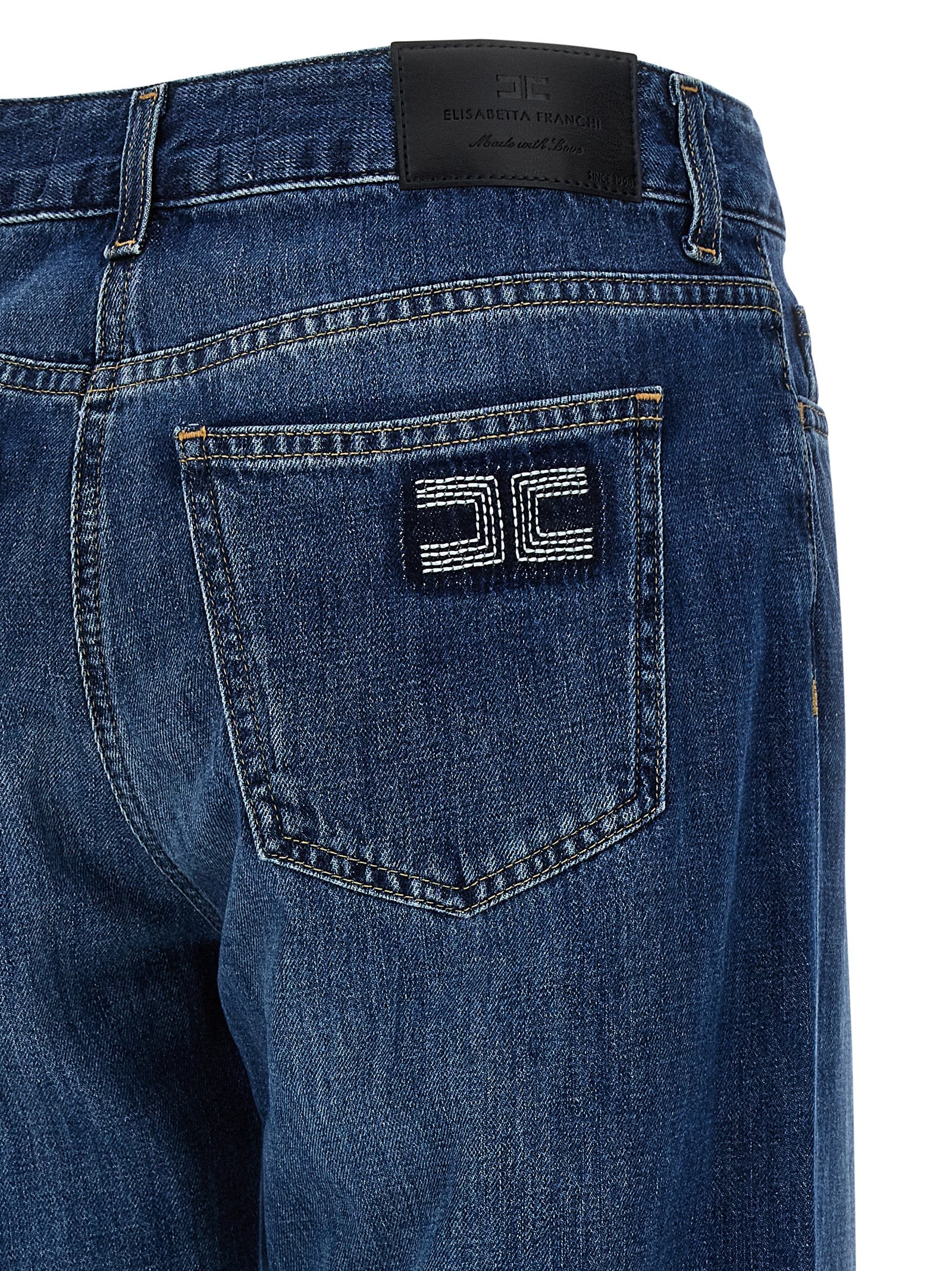 Jeans by Elisabetta Franchi for women in denim cotton blue & signature presents a tailored silhouette, showcasing a tailored wide and long cut with a refined low rise for a truly tailored aesthetic.