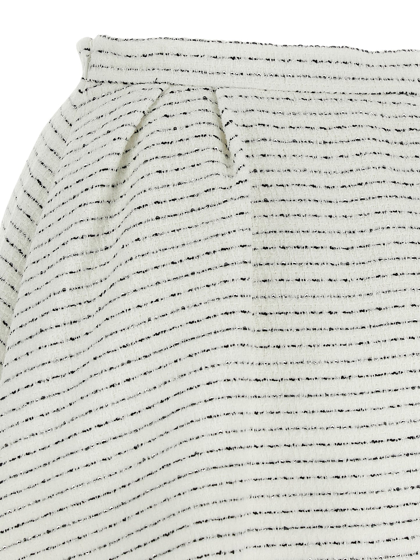 Skirt by Alessandra Rich for women in poly cotton tweed & sequins white showcases a sultry silhouette, elegantly defined by its mini long and the sophisticated sultry design of the Women's Poly Cotton Tweed & Sequins Mini Long Skirt.
