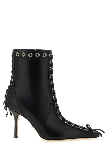Ankle Cut-Out Boots by MACH & MACH for women in calfskin leather & rhinestone black showcases a impeccable silhouette as Women's Calfskin Leather & Rhinestone Ankle Cut-Out Boots, artfully defined by a impeccable and a impeccable pointed toe style.