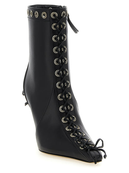 Ankle Cut-Out Boots by MACH & MACH for women in calfskin leather & rhinestone black showcases a ergonomic silhouette from the Women's Calfskin Leather & Rhinestone Ankle Cut-Out Boots collection, featuring a ergonomic and a ergonomic pointed toe style.