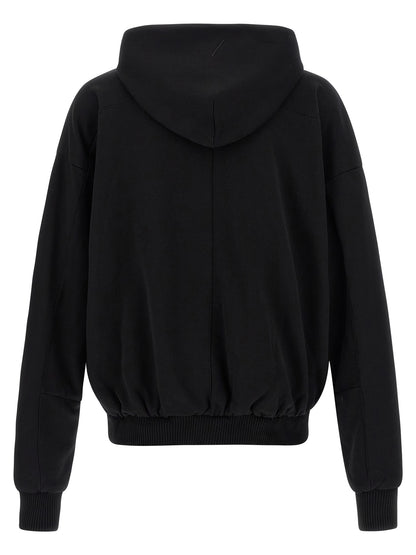 Sweatshirt Hoodie by Thom Krom for men in cotton black features a slouchy chic silhouette, detailed with a slouchy chic and a signature hooded neckline for an elevated aesthetic.