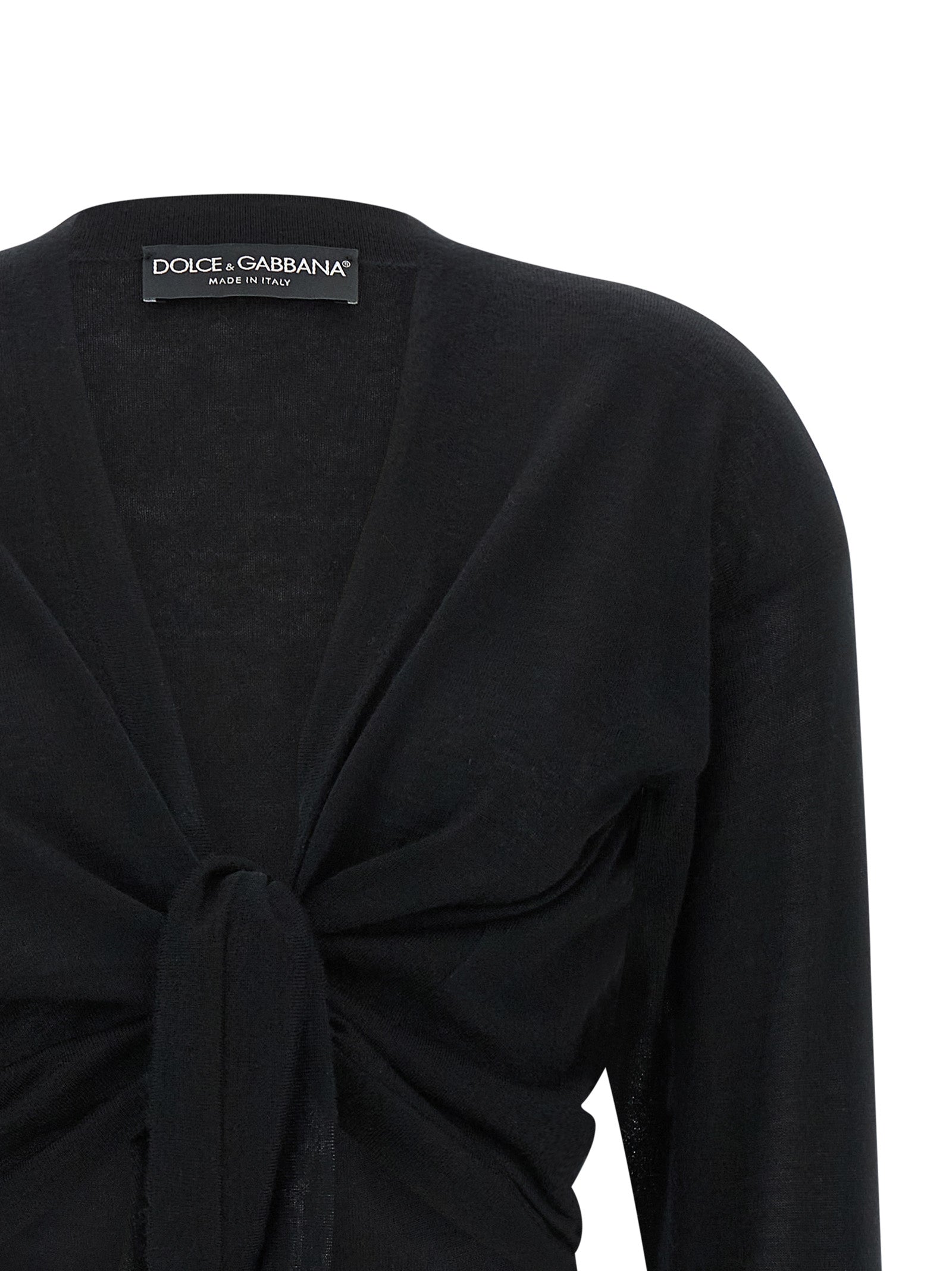 Cardigan by Dolce & Gabbana for women in cashmere black features an impeccable silhouette, showcasing a sophisticated wrap asymmetric neckline and detail for a truly impeccable finish.