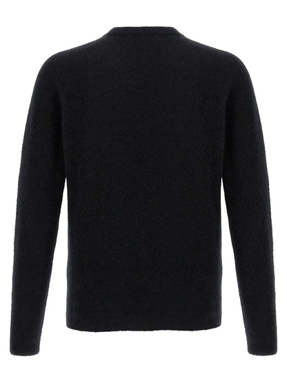 Cardigan by Roberto Collina for men in silk cashmere & polyester black features an impeccable silhouette, showcasing a sophisticated crew neckline and detail for a truly impeccable finish.