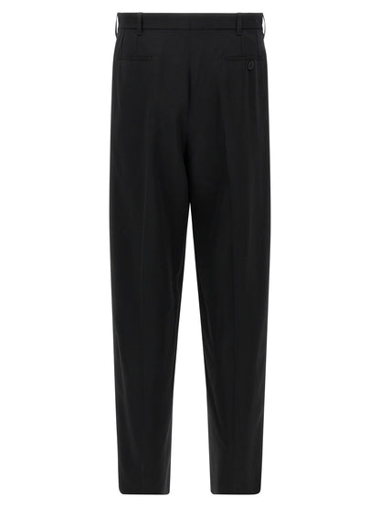 Trousers by Marni for men in virgin wool black features an on trend silhouette, showcasing a sophisticated straight-leg with a long and for an on trend finish.