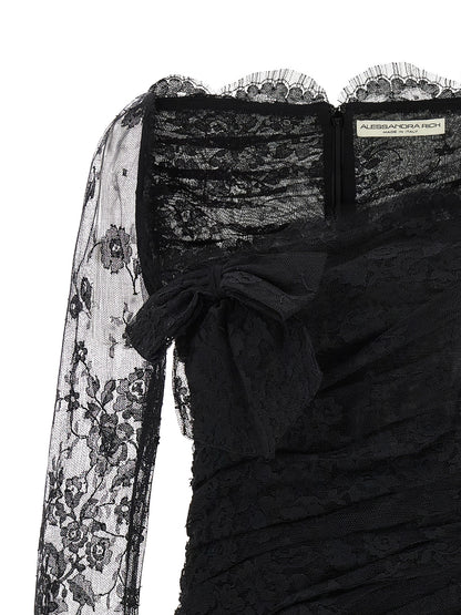 Dress by Alessandra Rich for women in organic cotton & polyamide black & transparent features an sultry silhouette defined by a plunging neckline and , falling to an sultry short mini for a sultry look.