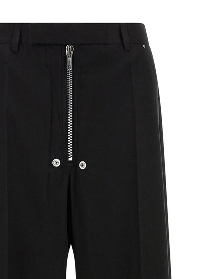 Pants by Rick Owens for women in wool cotton black showcases a unrivaled comfort silhouette, featuring a wide cut and long with a for a unrivaled comfort and refined aesthetic.