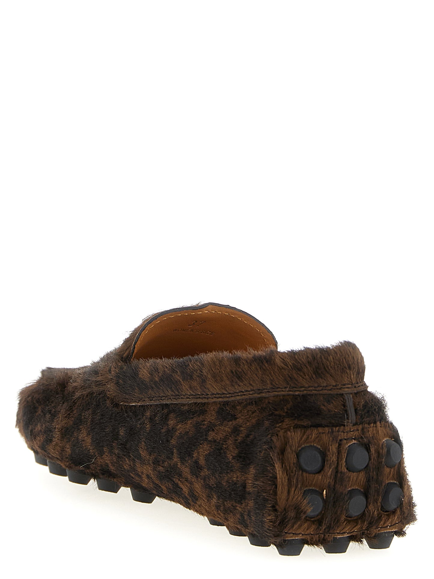 Flat Loafer Slip-On Shoes by Tod's for women in calfskin leather brown showcases a resplendent Pony Women's Calfskin Leather Flat Loafer Slip-On Shoes aesthetic, defined by its resplendent and elegant flat.