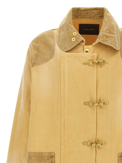 Overcoat by WALES BONNER for men in cotton corduroy beige showcases a architectural silhouette, artfully detailed with a distinctive shirt-collar neckline and functional for a architectural finish.