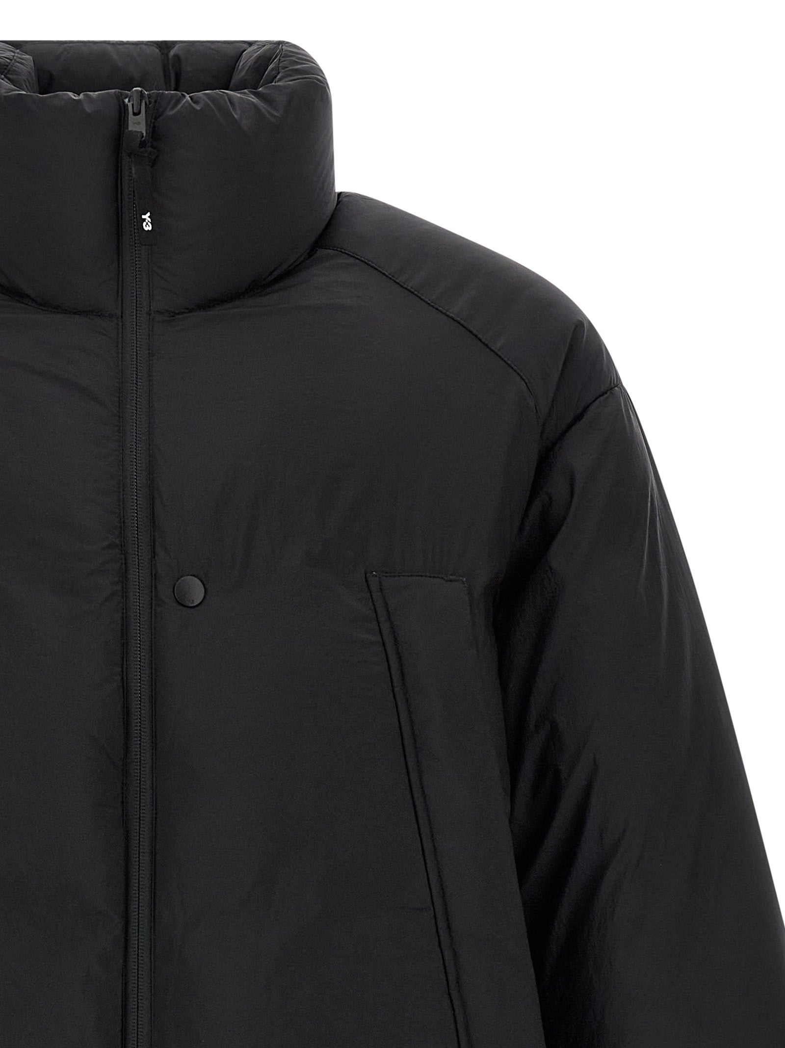 Puffer Jacket by Y-3 for men in nylon black features an contemporary silhouette, showcasing a sophisticated and contemporary windproof, pockets & insulated for a truly refined look.