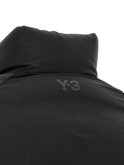 Puffer Jacket by Y-3 for men in nylon black presents a effortlessly chic silhouette, showcasing a sophisticated and premium windproof, pockets & insulated for a truly effortlessly chic finish.