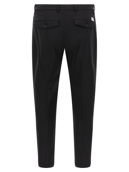 Trousers by Department 5 for men in polyester & virgin wool black presents a smart silhouette, meticulously detailed with a smart cropped, a smart cropped, and a smart .