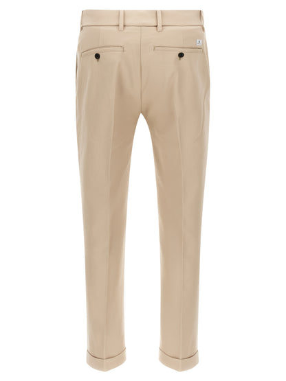Chinos Pants by Department 5 for men in cotton beige features an perennial straight-leg and long, expertly tailored with a perennial low rise for a refined silhouette.