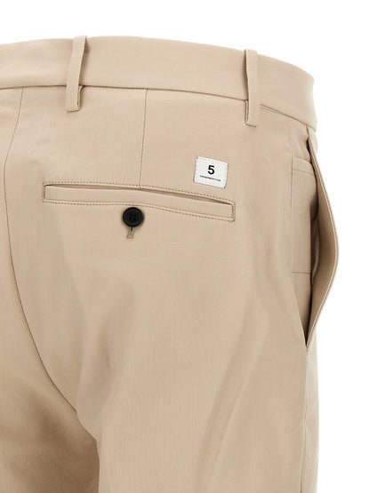 Chinos Pants by Department 5 for men in cotton beige presents a sartorial luxe silhouette, showcasing a sophisticated straight-leg with a long and low rise for a premium, sartorial luxe finish.