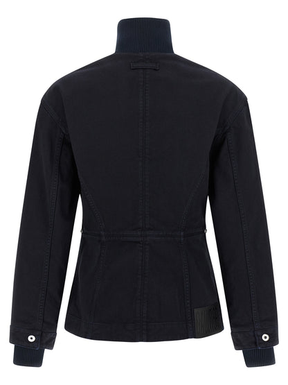 This Trucker Jacket by Jean Paul Gaultier for women in denim cotton blue exhibits a edgy silhouette, meticulously detailed with functional and a edgy for a edgy finish.