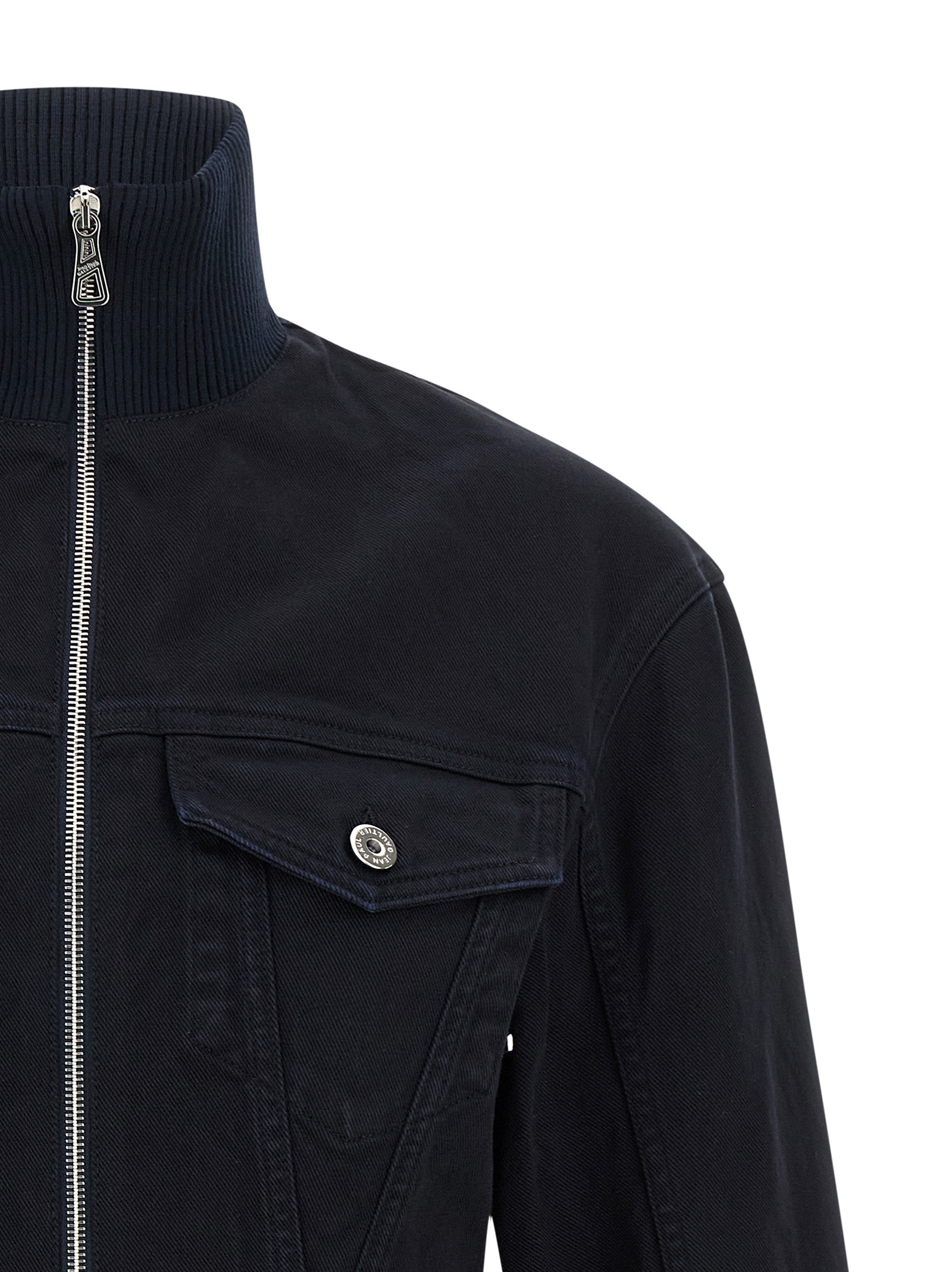 Trucker Jacket by Jean Paul Gaultier for women in denim cotton blue features an contemporary silhouette, showcasing a sophisticated and contemporary for a truly refined look.