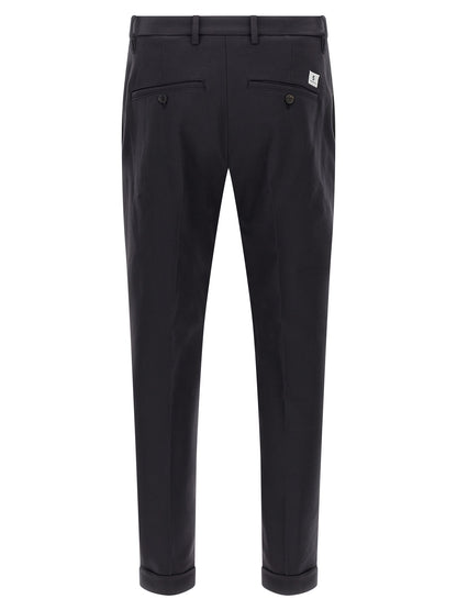 Chinos Pants by Department 5 for men in cotton blue features an sharp straight-leg and long with a low rise, highlighting a sharp silhouette for a sophisticated look.