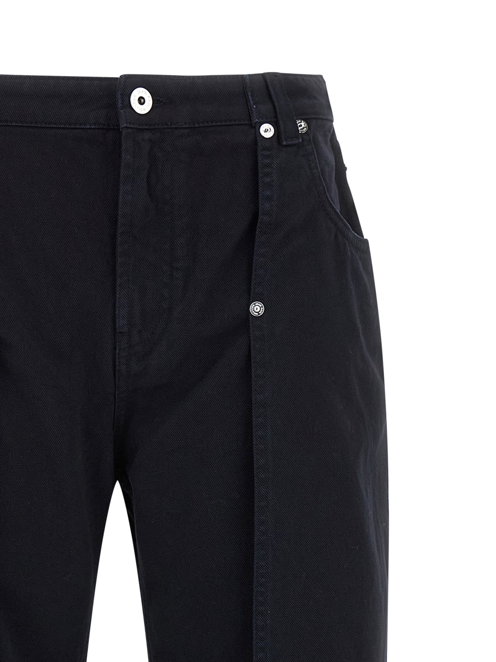 Jeans by Jean Paul Gaultier for women in denim cotton blue presents a tailored silhouette, showcasing a tailored wide and long cut with a refined for a truly tailored aesthetic.