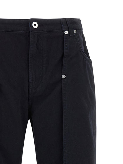 Jeans by Jean Paul Gaultier for women in denim cotton blue presents a tailored silhouette, showcasing a tailored wide and long cut with a refined for a truly tailored aesthetic.