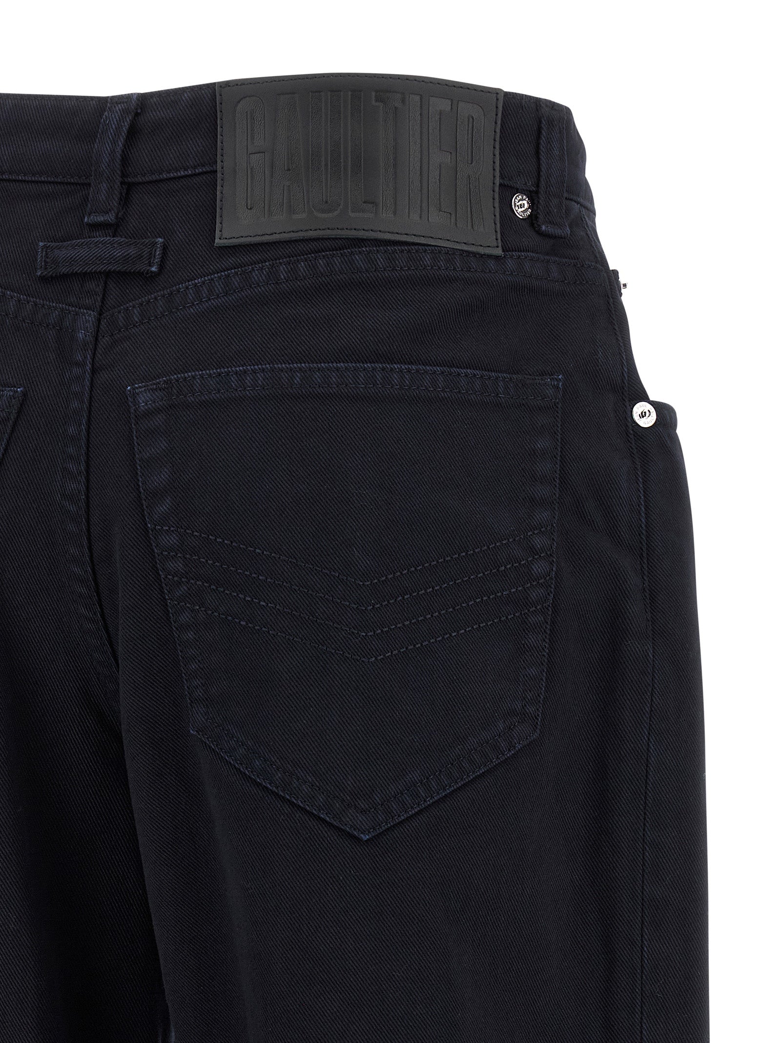 Jeans by Jean Paul Gaultier for women in denim cotton blue features an sophisticated and wide with a precise long, creating a sophisticated and sophisticated silhouette.