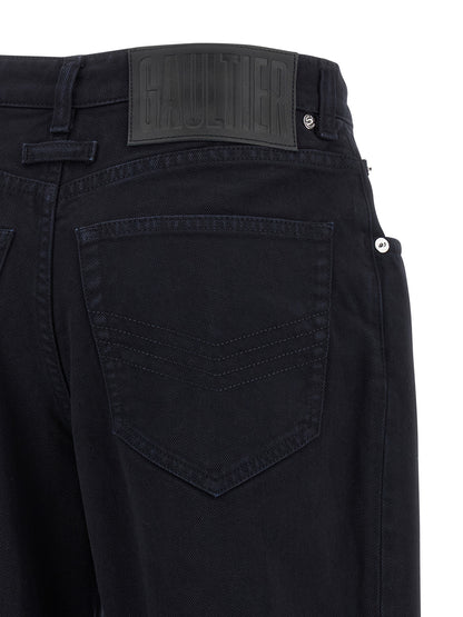 Jeans by Jean Paul Gaultier for women in denim cotton blue features an sophisticated and wide with a precise long, creating a sophisticated and sophisticated silhouette.
