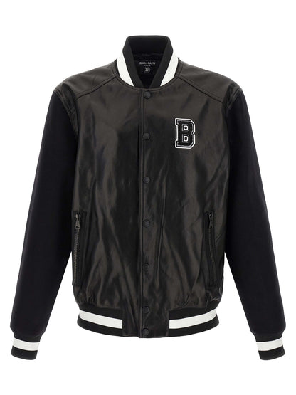Bomber Jacket by Balmain for men in lamb leather & cupro bicolour, black, white & signature features a city-ready silhouette, detailed with pockets and a city-ready .