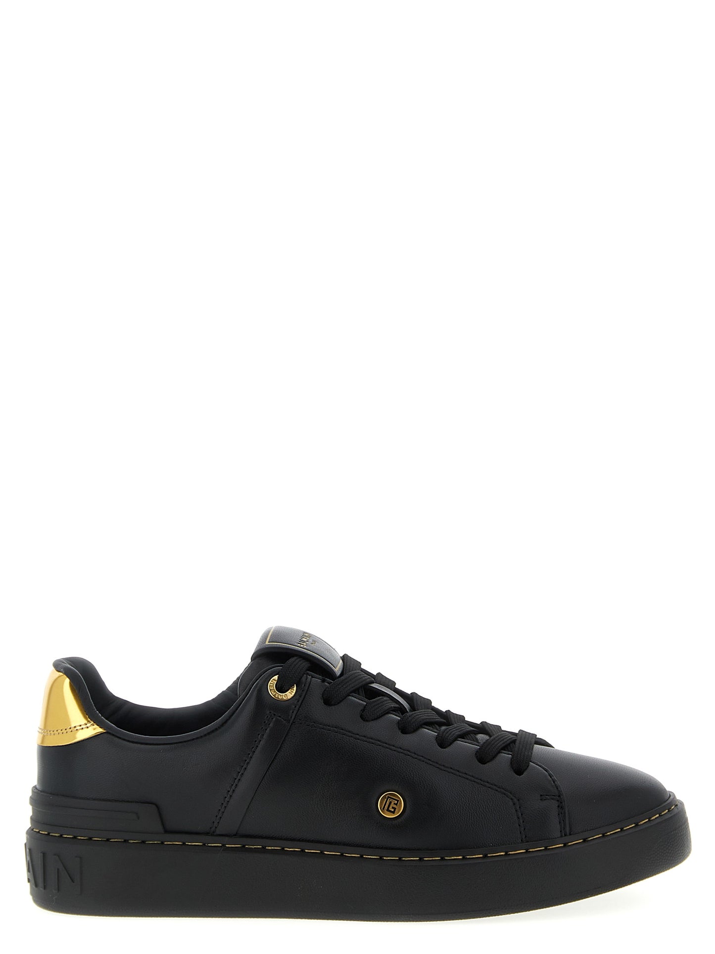 Sneakers by Balmain for women in calf & lamb leather black presents a sumptuous silhouette, artfully capturing the essence of the Women's Low Top Calf & Lamb Leather Sneakers with its sumptuous low-top style design.