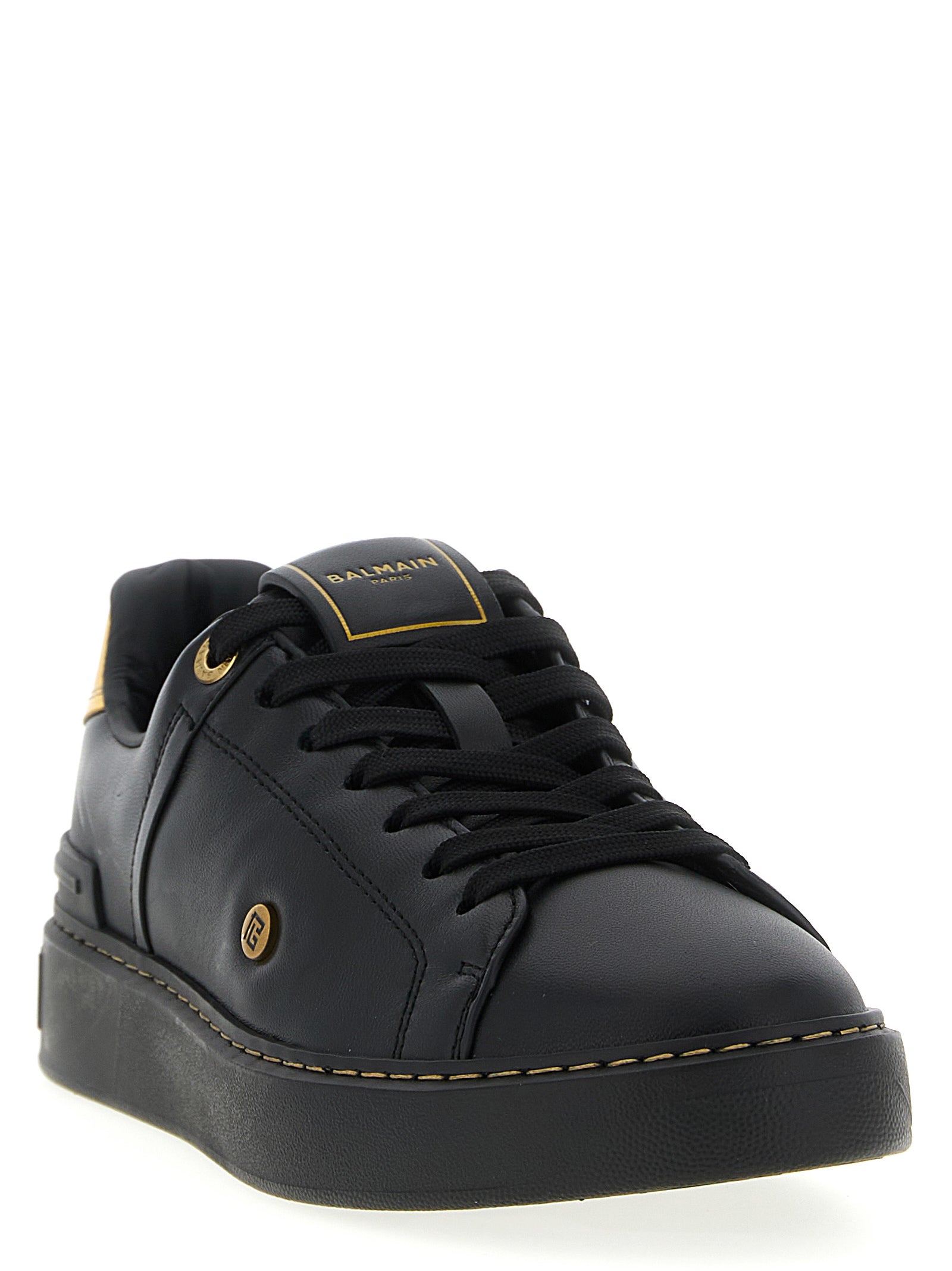 Sneakers by Balmain for women in calf & lamb leather black presents a impeccable silhouette as Women's Low Top Calf & Lamb Leather Sneakers, expertly defined by a impeccable low-top style for a impeccable, high-fashion look.