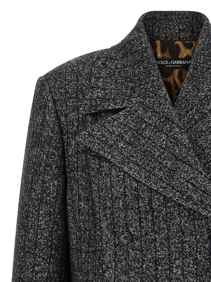 Blazer by Dolce & Gabbana for women in virgin wool & polyamide bicolour, animal, black, white, print & striped features an sartorial silhouette, showcasing a sophisticated and sartorial for a truly sartorial finish.