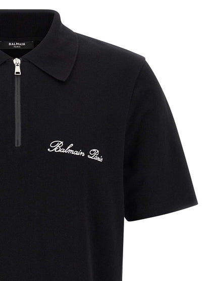 Polo Shirt by Balmain for men in cotton bicolour, black & white showcases a sharp silhouette, detailed with a refined and sharp for a sophisticated finish.
