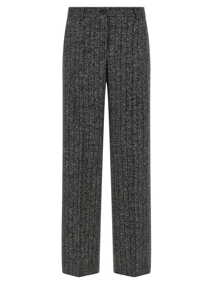 Trousers by Dolce & Gabbana for women in virgin wool & polyamide bicolour, animal, black, white, print & striped features a artisanal silhouette, showcasing a sophisticated straight-leg with a long and low rise for a artisanal finish.