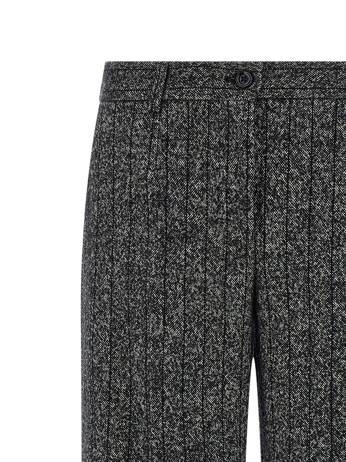 Trousers by Dolce & Gabbana for women in virgin wool & polyamide bicolour, animal, black, white, print & striped presents a smart silhouette, meticulously detailed with a smart straight-leg, a smart long, and a smart low rise.