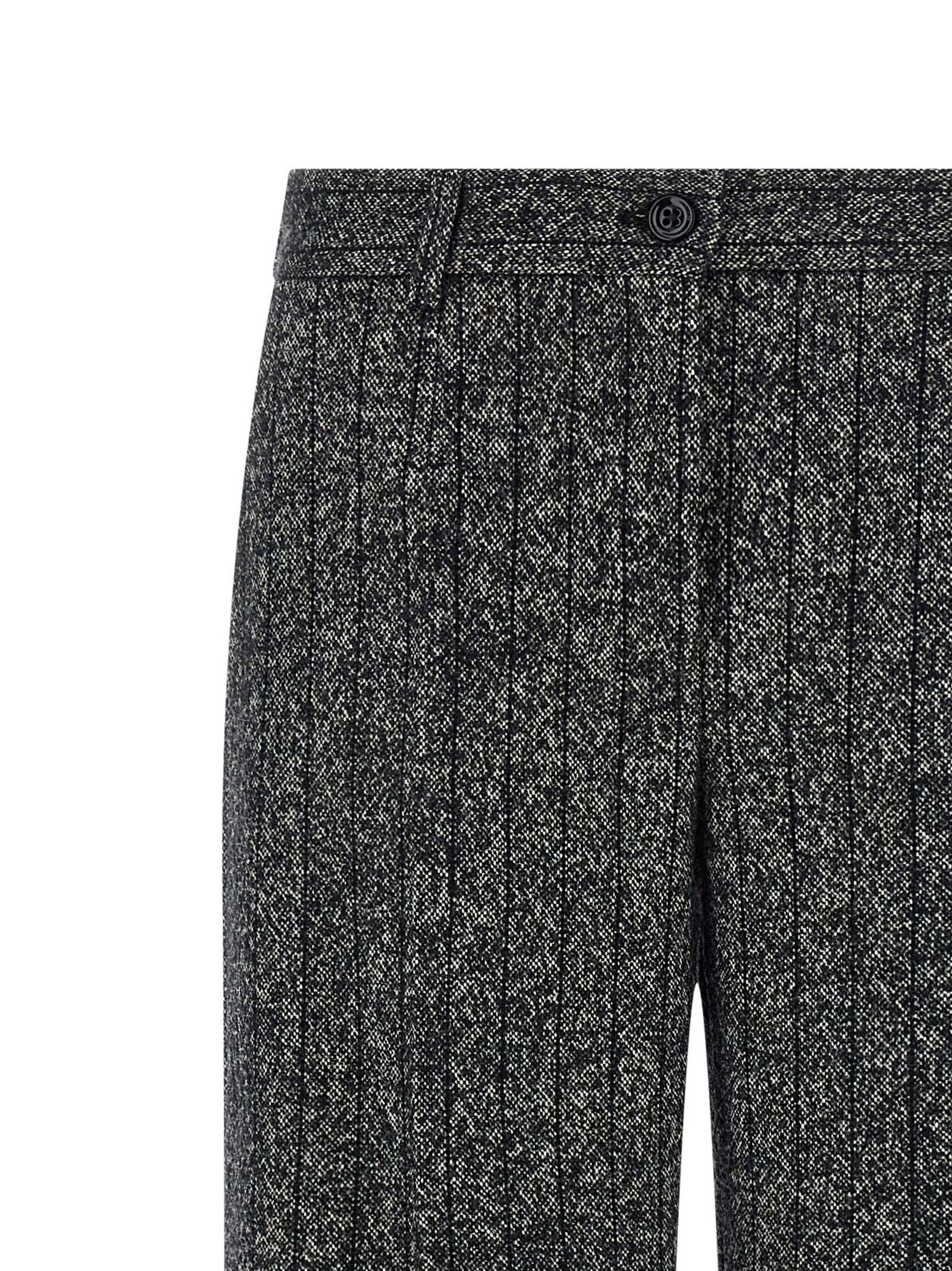 Trousers by Dolce & Gabbana for women in virgin wool & polyamide bicolour, animal, black, white, print & striped presents a smart silhouette, meticulously detailed with a smart straight-leg, a smart long, and a smart low rise.