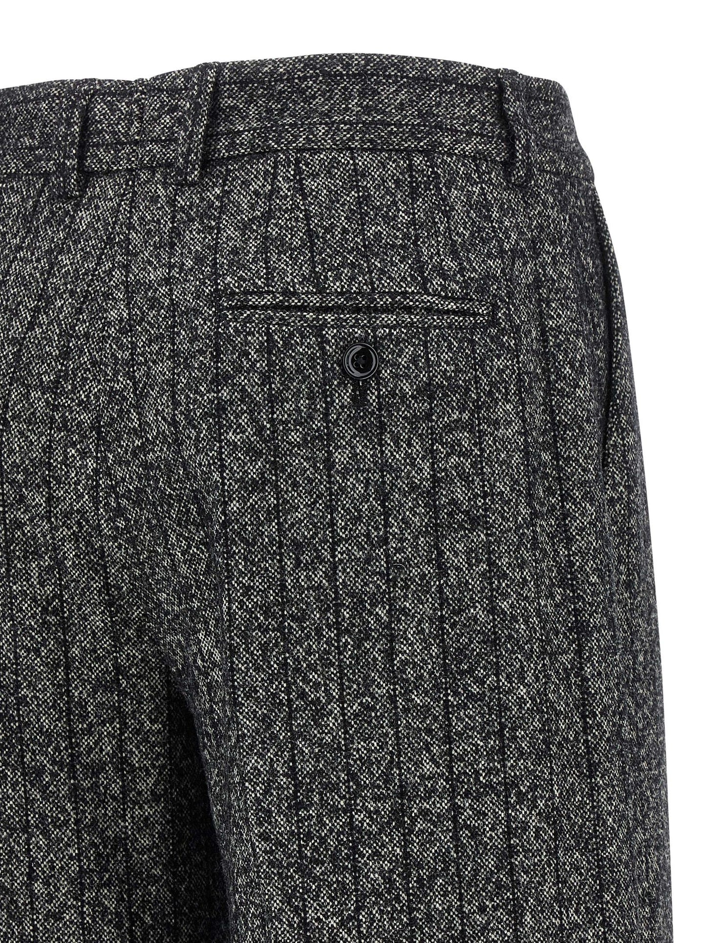 Trousers by Dolce & Gabbana for women in virgin wool & polyamide bicolour, animal, black, white, print & striped features a sculptural silhouette, showcasing a sculptural straight-leg and long with a sophisticated low rise for a sculptural finish.
