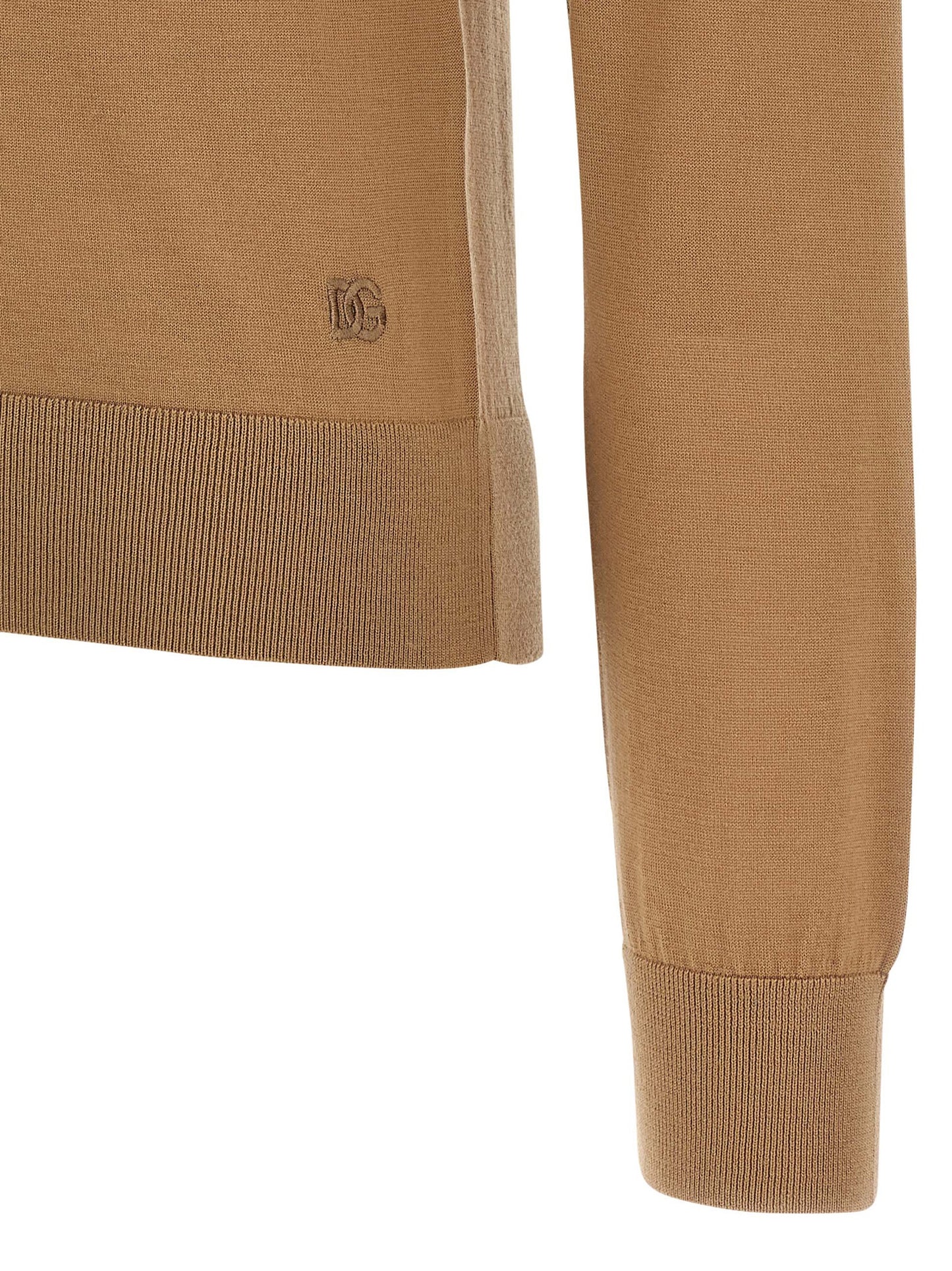 Cardigan by Dolce & Gabbana for women in cashmere beige features a dramatic silhouette, showcasing a sophisticated and dramatic detail for a timeless, premium look.