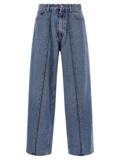 Jeans by MM6 Maison Margiela for men in cotton denim blue features a polished silhouette with a polished wide, reaching a polished long and finished with a polished .