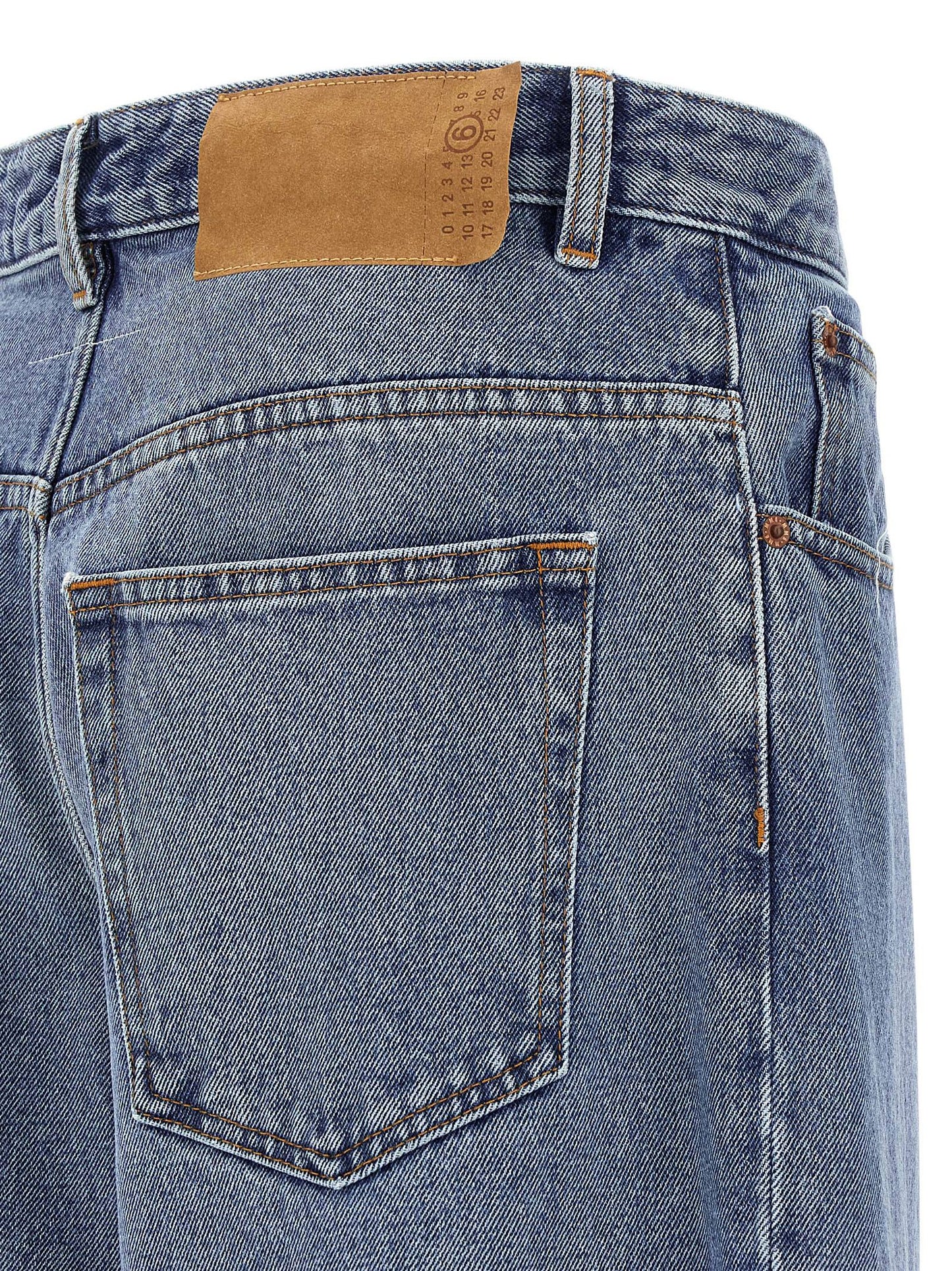 Jeans by MM6 Maison Margiela for men in cotton denim blue presents a refined pantology silhouette, artfully defined by a refined pantology wide, long, and a sophisticated .