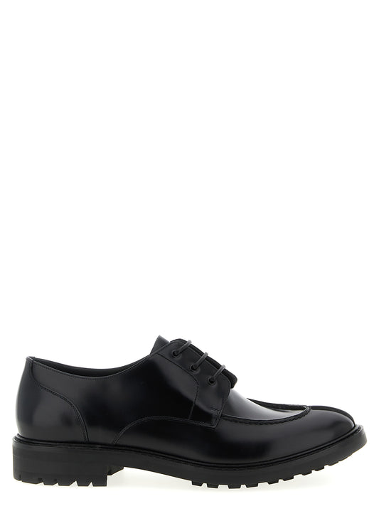 Derby Lace-Up Shoes by Saint Laurent for men in calfskin leather black features an dynamic silhouette from the Men's Calfskin Leather Derby Lace-Up Shoes collection, defined by a dynamic almond toe style and for a dynamic look.