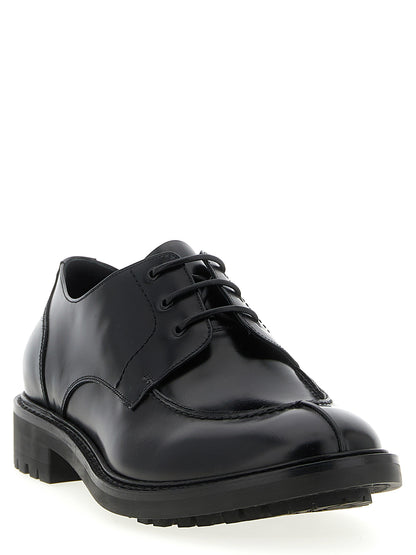 Derby Lace-Up Shoes by Saint Laurent for men in calfskin leather black showcases a impeccable silhouette as Men's Calfskin Leather Derby Lace-Up Shoes, artfully designed with a impeccable and refined almond toe style for a impeccable finish.