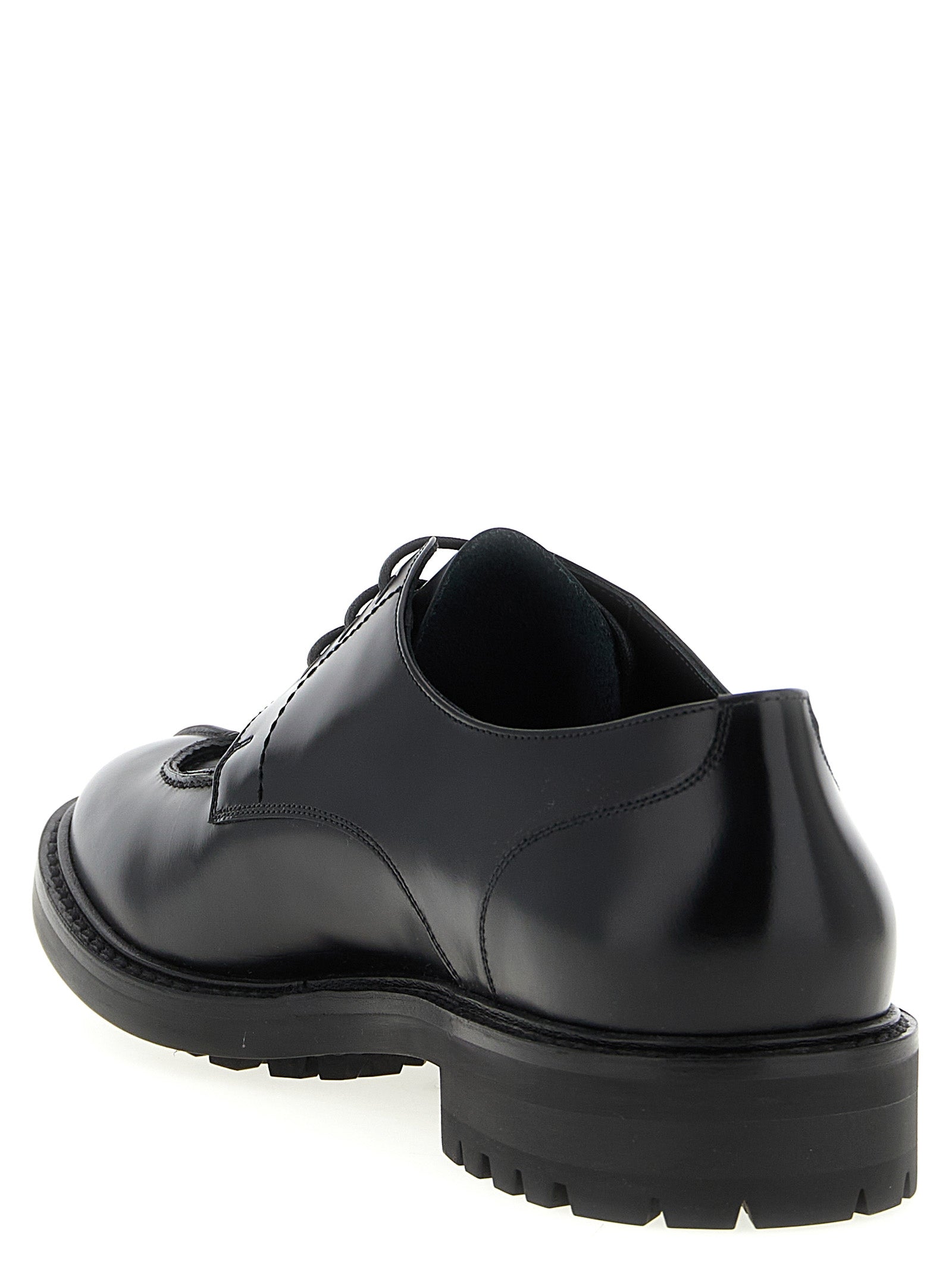 Derby Lace-Up Shoes by Saint Laurent for men in calfskin leather black features an effortless chic silhouette, showcasing the Men's Calfskin Leather Derby Lace-Up Shoes design with an effortless chic and a almond toe style for a effortless chic look.