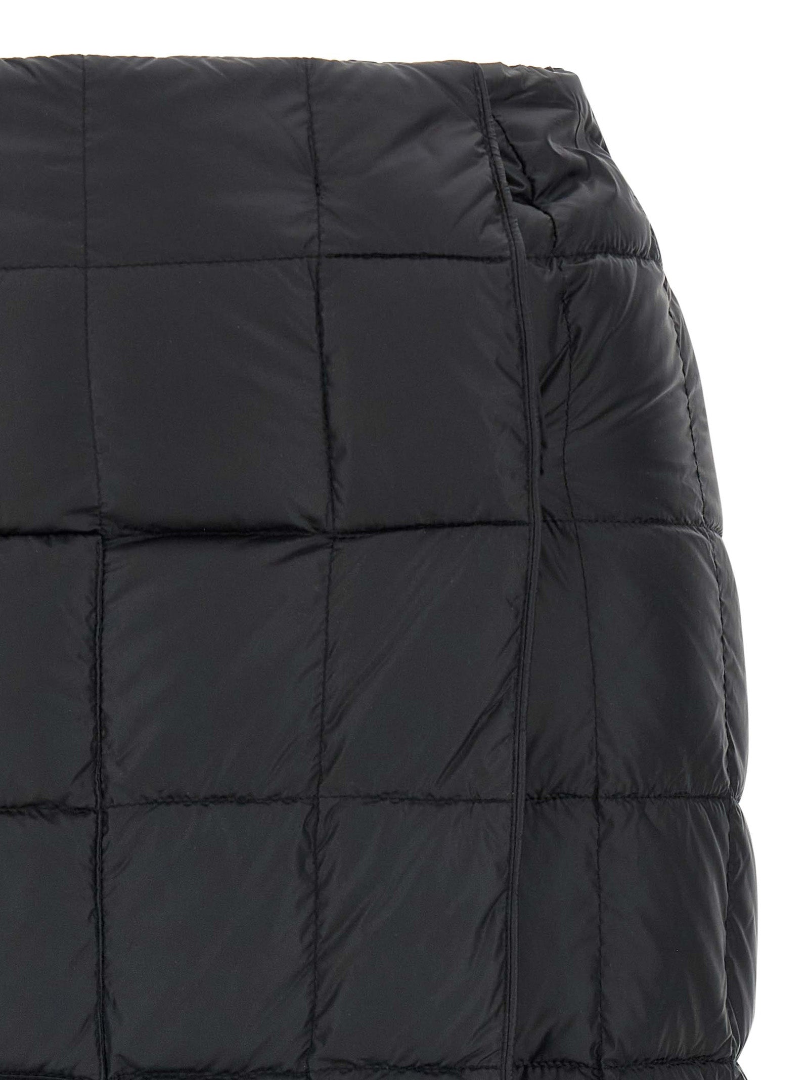 Skirt by IENKI IENKI for women in nylon & goose down black features a contoured silhouette from the Women's High Rise Nylon & Goose Down Mini Long Skirt collection, characterized by its contoured mini long for a contoured finish.