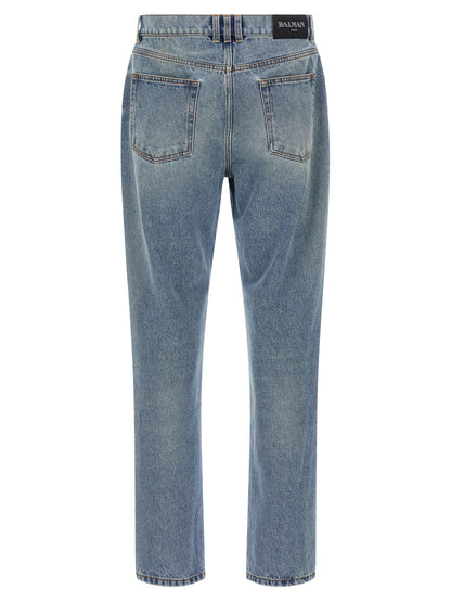 Jeans by Balmain for men in denim cotton blue & signature features an refined tailoring silhouette, showcasing a premium straight-leg with a and long cut for a refined tailoring look.